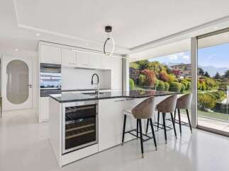 Experience luxury living in this stunning kitchen with a modern design.