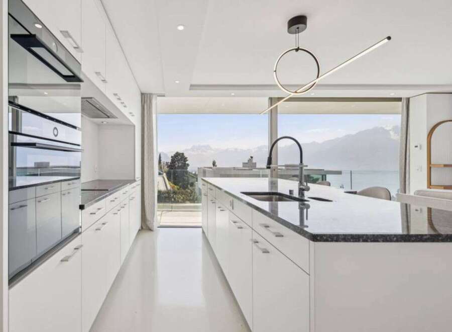 Experience luxury living in this stunning kitchen with breathtaking views.