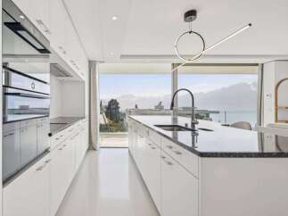 Experience luxury living in this stunning kitchen with breathtaking views.