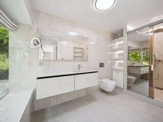 Step into luxury with this stunning modern bathroom.