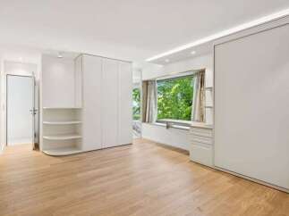 This stunning property boasts a modern and minimalist design, perfect for those seeking a sleek and stylish living space.
