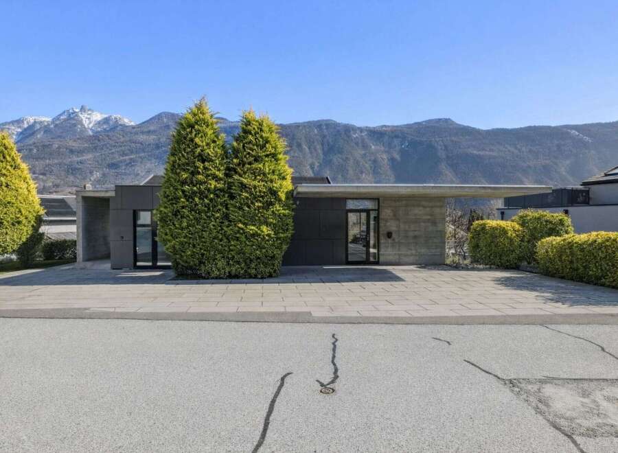 Discover modern luxury in this stunning property, boasting a sleek, contemporary design.