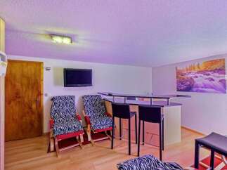 Discover the perfect blend of relaxation and entertainment in this stylish space.