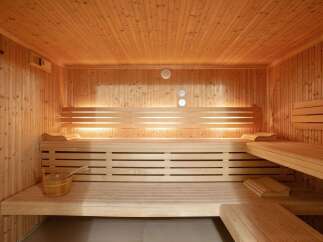 Step into relaxation with this stunning sauna, a perfect addition to any home spa.
