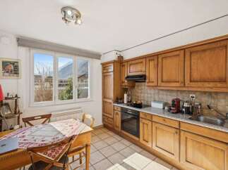 This charming kitchen offers a warm and inviting atmosphere, perfect for culinary adventures.