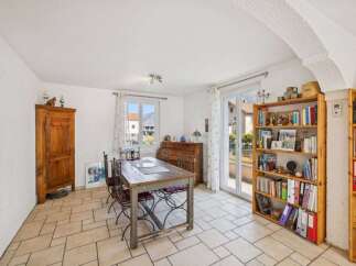 Discover the charm of this inviting dining area, perfect for family gatherings and entertaining guests.