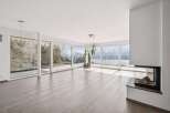 Experience luxury living in this stunning property with expansive windows offering breathtaking views.