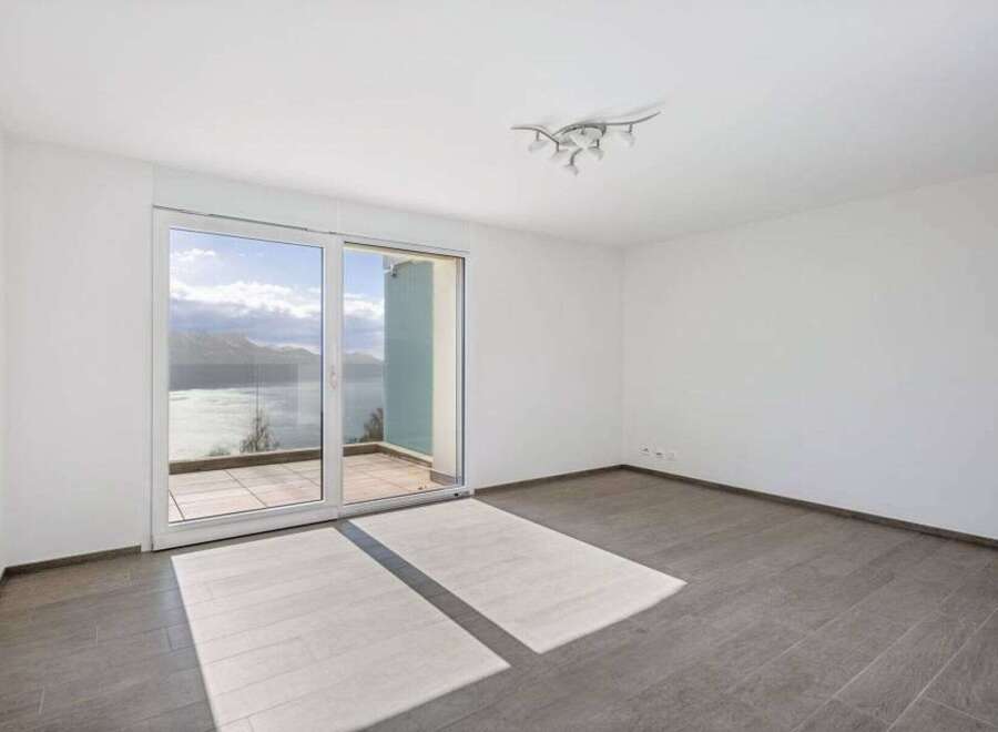 Experience breathtaking views from this stunning property! This home features a spacious interior with large windows that offer panoramic views of the surrounding landscape.