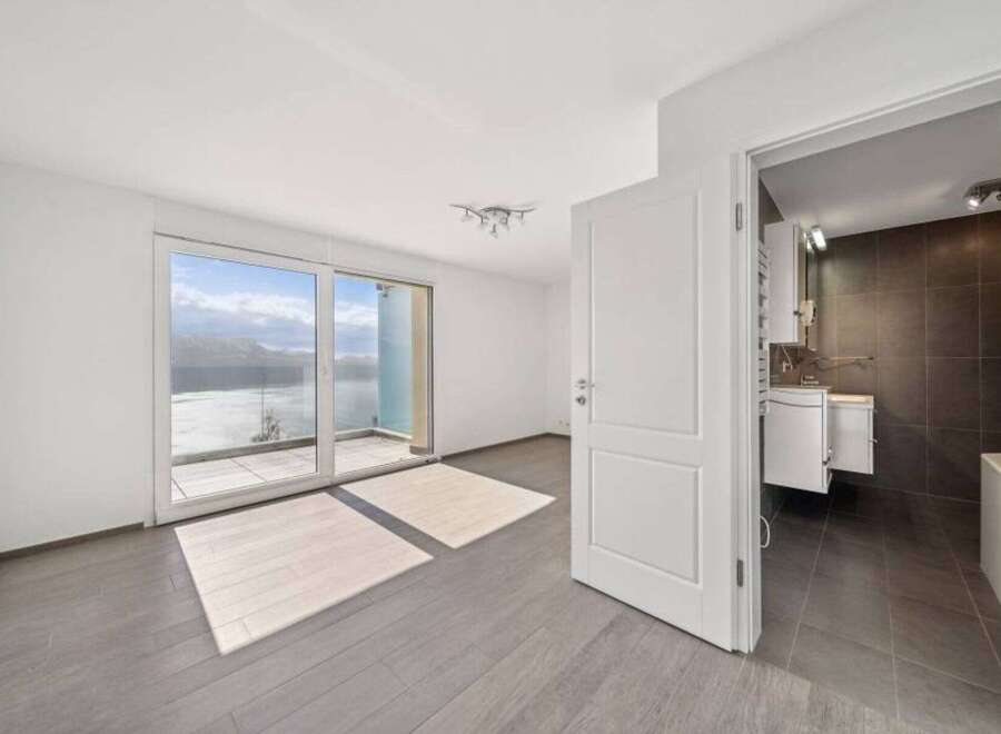 Experience luxury living in this stunning property featuring a bright and airy interior.