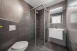 Step into modern elegance with this stunning bathroom.