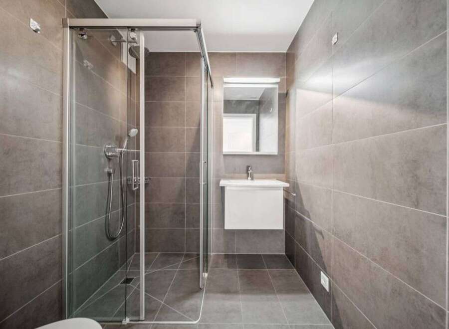 Step into modern luxury with this stunning bathroom.