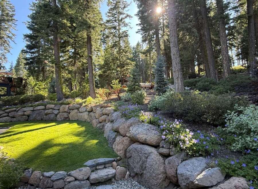 Discover the tranquility of this stunning property, nestled amidst a lush, wooded landscape.