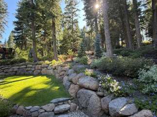 Discover the tranquility of this stunning property, nestled amidst a lush, wooded landscape.