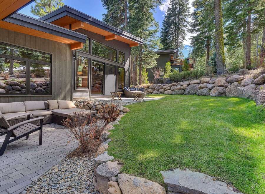 Experience luxury living in this stunning property featuring a modern design and a serene outdoor space.