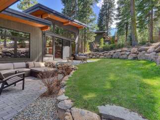 Experience luxury living in this stunning property featuring a modern design and a serene outdoor space.