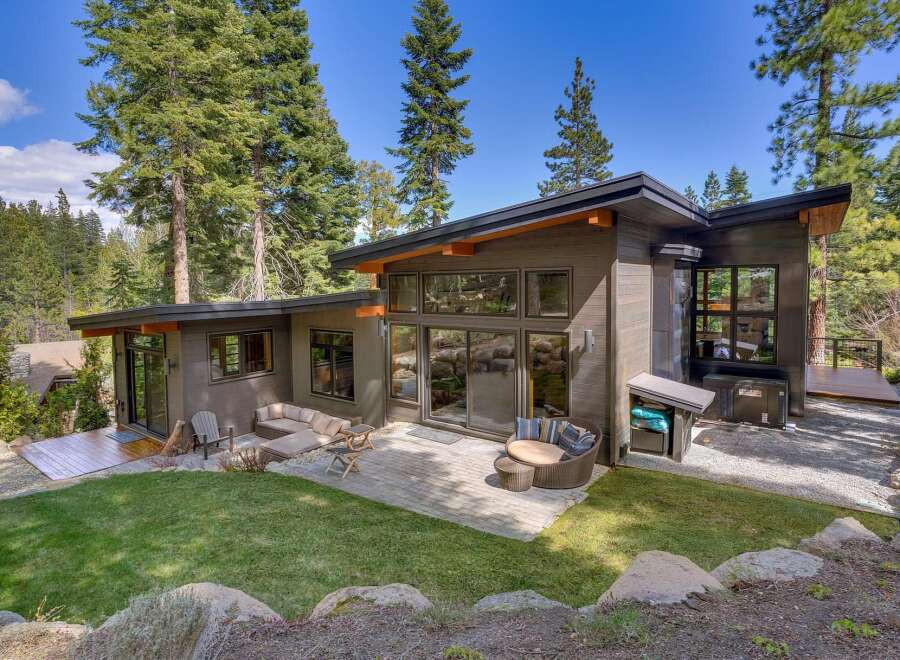 Discover modern luxury nestled in nature with this stunning property.