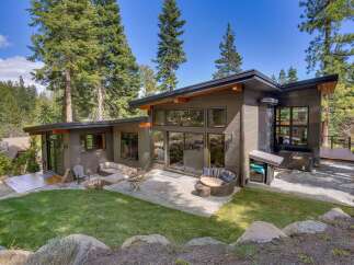 Discover modern luxury nestled in nature with this stunning property.