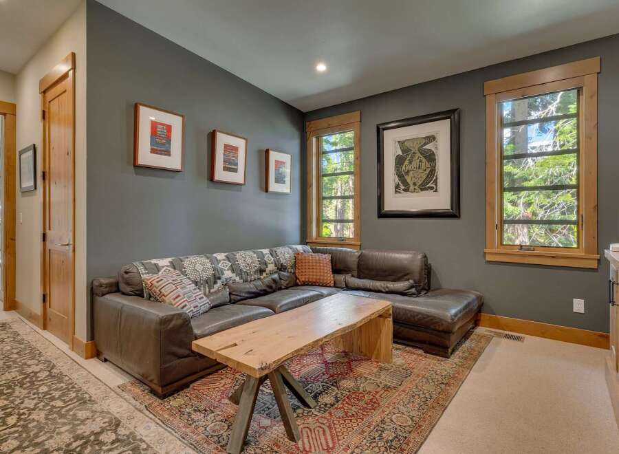 This stunning living room boasts a cozy sectional sofa, perfect for relaxing and entertaining.