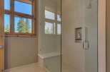 Step into a luxurious bathroom with a modern shower design.
