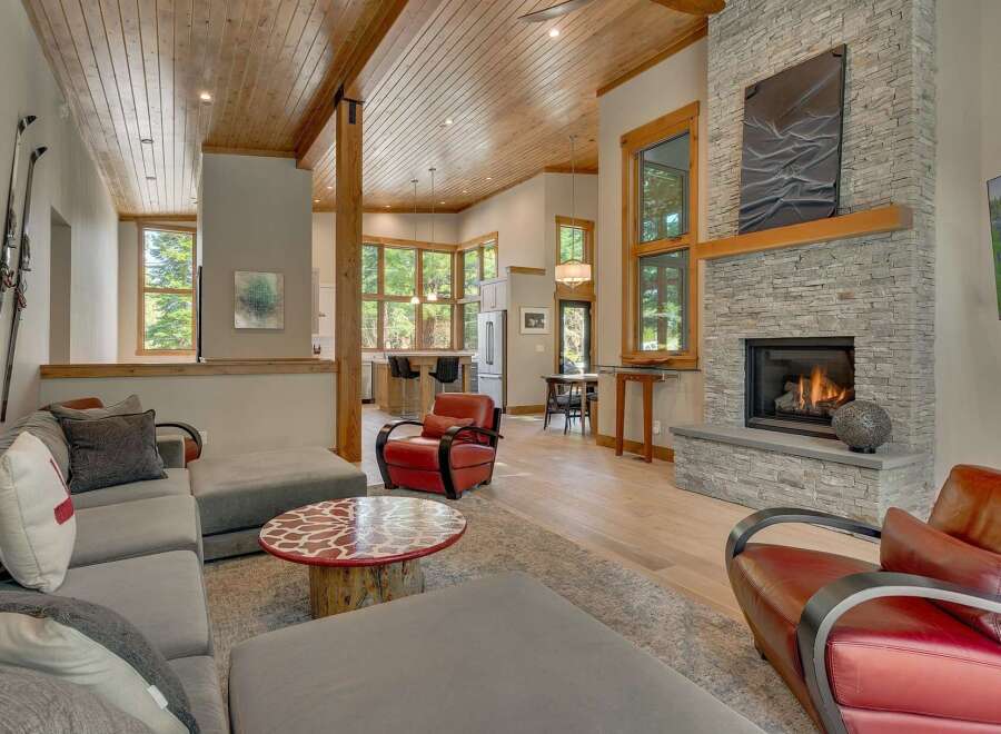 Experience luxury living in this stunning property featuring a cozy fireplace, perfect for chilly evenings.