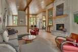Experience luxury living in this stunning property featuring a cozy fireplace, perfect for chilly evenings.