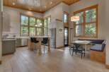 Experience the epitome of modern living in this stunning property, boasting a bright and airy interior with expansive windows that flood the space with natural light.