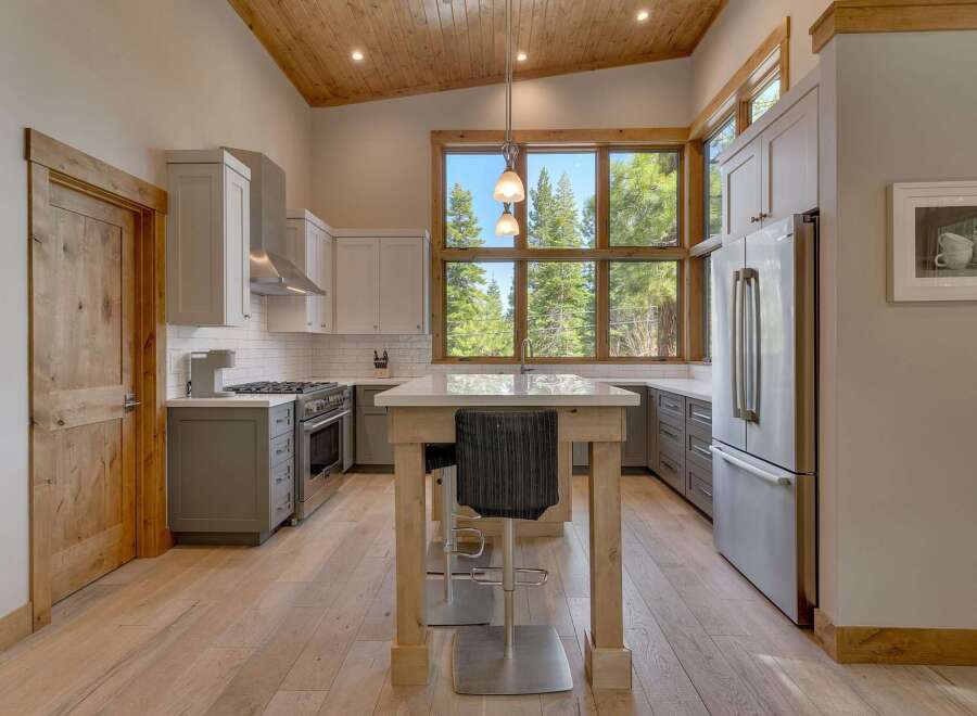 This stunning kitchen boasts a modern design with high-end finishes.