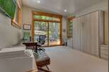 This stunning home office boasts a serene ambiance, perfect for productivity and relaxation.