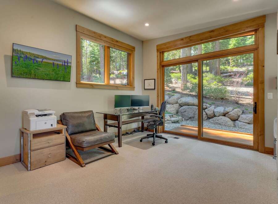This stunning property boasts a bright and airy home office, perfect for remote work or creative endeavors.