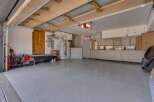 This spacious garage offers ample storage and functionality.