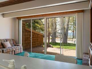 Enjoy stunning views from this beautiful property! This home features large windows that offer plenty of natural light and a seamless connection to the outdoors.