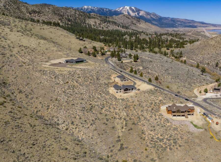 Discover your dream home in this stunning mountain retreat! This property boasts breathtaking views and offers a serene escape.
