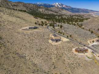 Discover your dream home in this stunning mountain retreat! This property boasts breathtaking views and offers a serene escape.