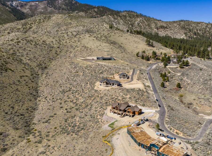 Discover luxury living in this stunning hillside property, offering breathtaking views and unparalleled privacy.