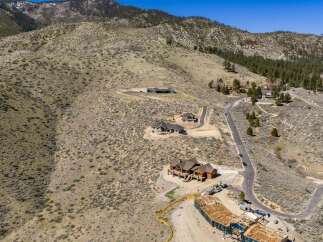 Discover luxury living in this stunning hillside property, offering breathtaking views and unparalleled privacy.