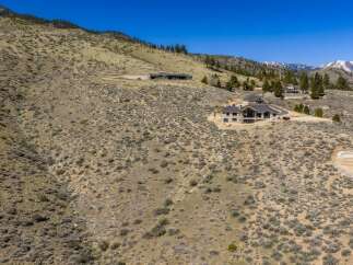 Discover luxury living in this stunning hillside property.