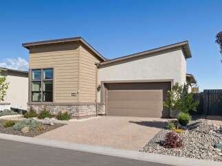 This stunning property boasts a modern design with a beautiful exterior.