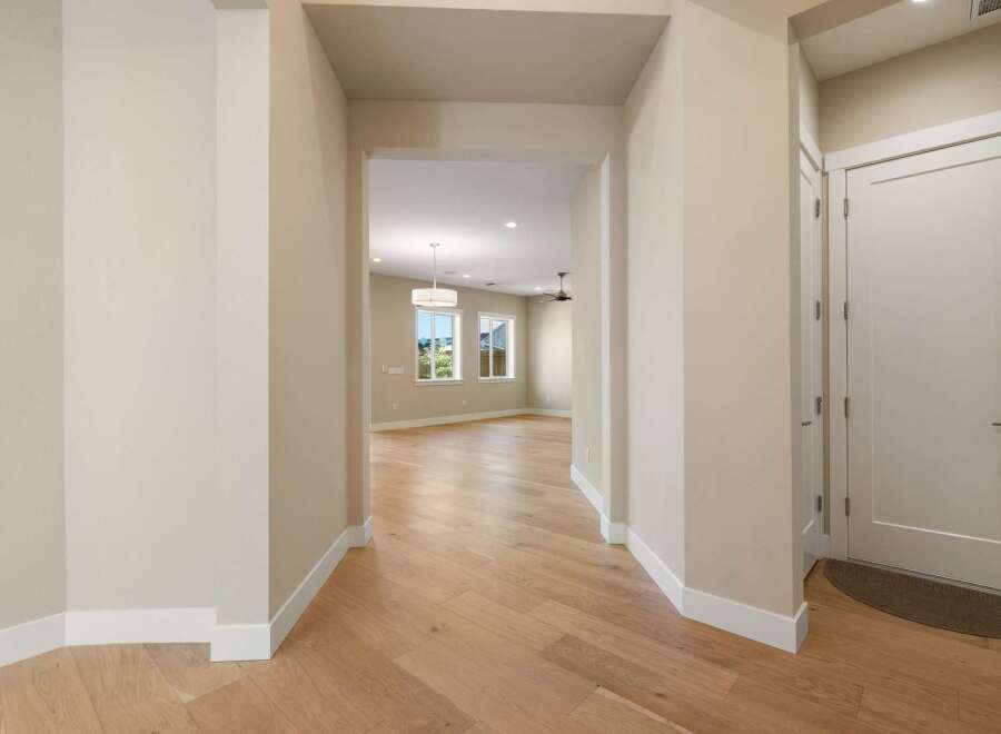 Step into this beautifully designed home and be greeted by a warm and inviting entryway.