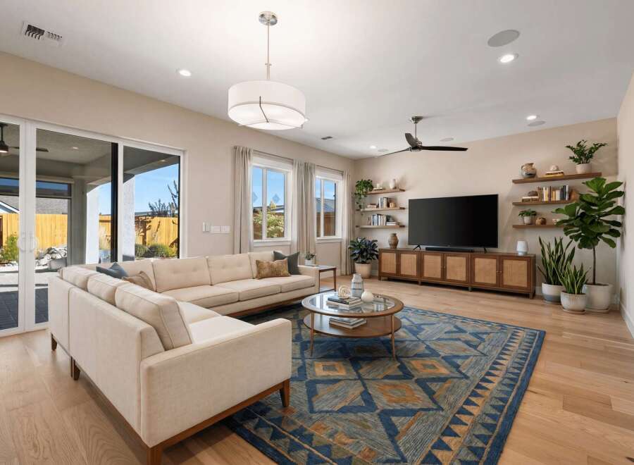 Step into luxury with this stunning living room, featuring a spacious layout and elegant design.