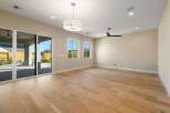 Step into this stunning, light-filled room featuring beautiful hardwood floors and a modern design.