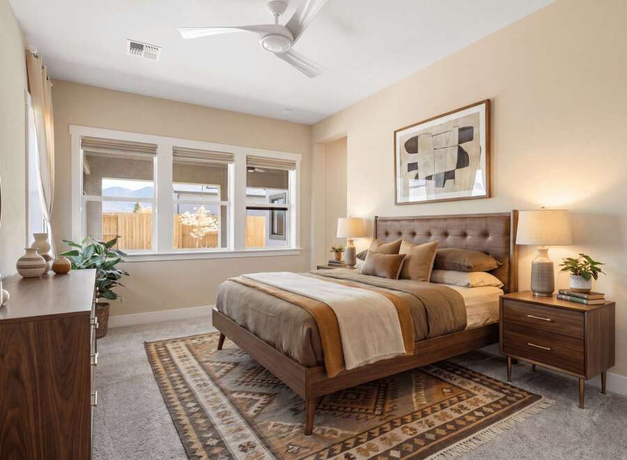 This stunning bedroom showcases a modern design with a touch of warmth.