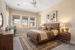 This stunning bedroom showcases a modern design with a touch of warmth.