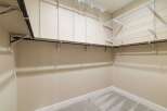 Step into this well-organized closet, designed for optimal storage and easy access.