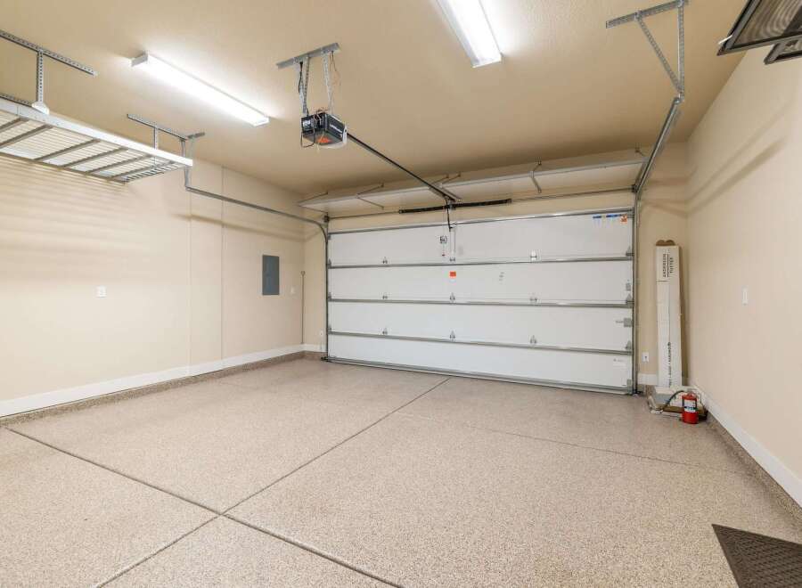 This spacious garage offers ample room for parking and storage.