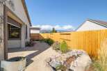 Discover your dream outdoor oasis with this stunning property! This backyard boasts a beautifully crafted water feature, perfect for relaxation and adding a touch of nature.