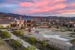 Discover luxury living at this stunning property, featuring a beautiful community pool and modern architecture.