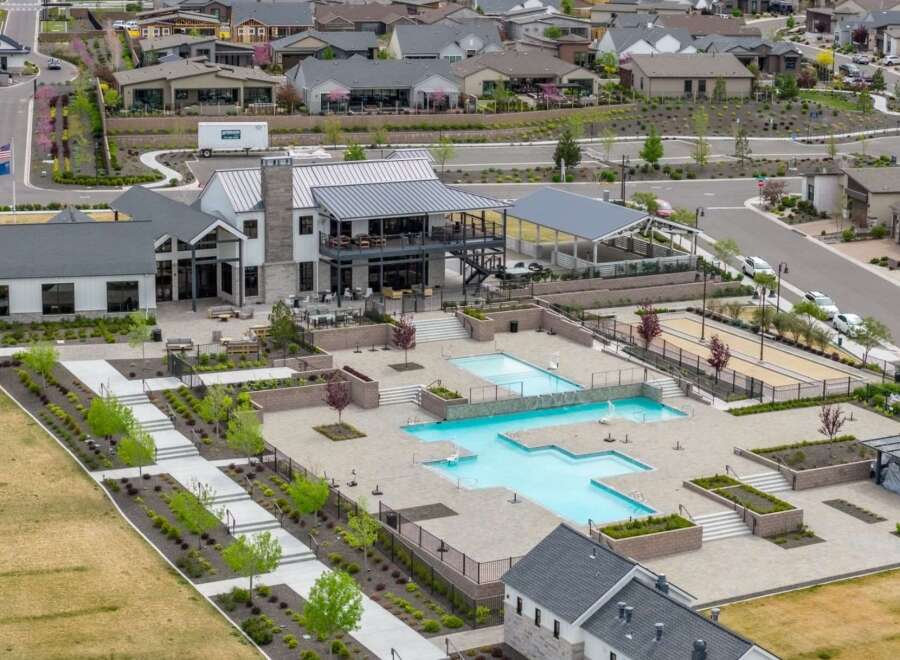 Discover luxury living at this stunning property featuring a beautiful pool area and modern architecture.