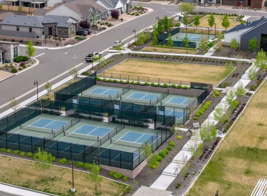 Discover the epitome of active living in this stunning property, featuring multiple pickleball courts for endless recreation.