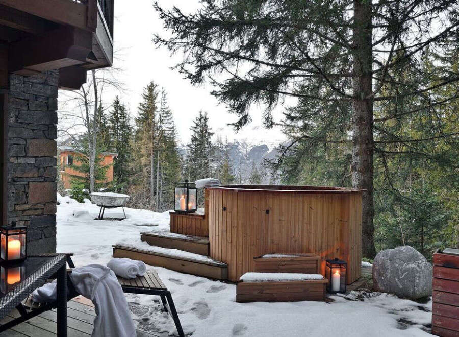 Escape to your own private oasis with this stunning property featuring a luxurious outdoor hot tub.