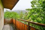 Enjoy breathtaking views from this charming balcony.